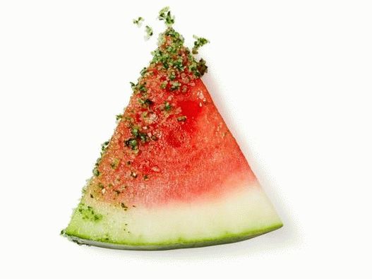 Photo Watermelon with tasty salt and herbs