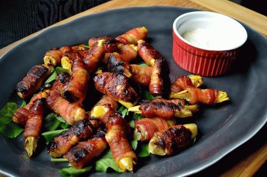 Photo of artichokes wrapped in bacon