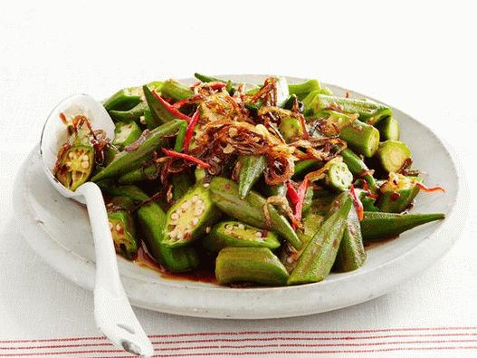 Photo of Okra fried in a wok with chili paste
