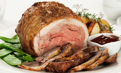 Photo Lamb shoulder baked with herbs