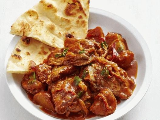 Photo Butter Chicken - Indian style chicken and creamy tomato sauce in a slow cooker