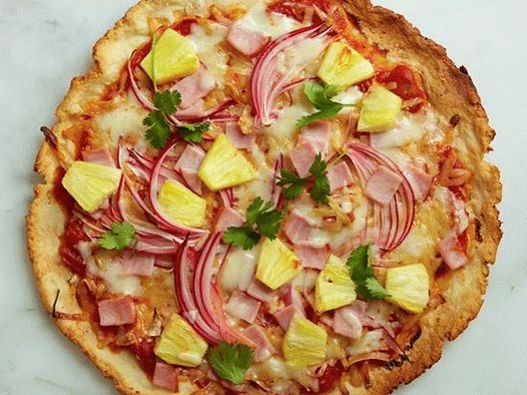 Photo Gluten-free pizza with ham and pineapple