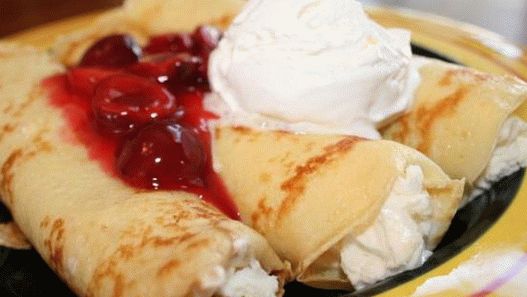 Photo Pancakes with mascarpone, chocolate and cherry sauce