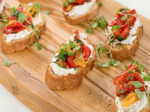 Photo of Bruschett with baked pepper and goat cheese