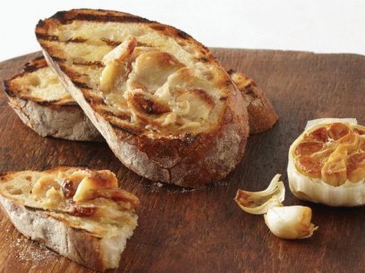 Photo of Bruschett with baked garlic