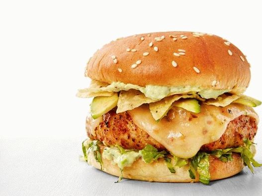 Photo burgers with turkey and avocado spread in tex-mex style