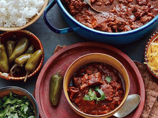 Photo of chili con carne cooked in a cauldron