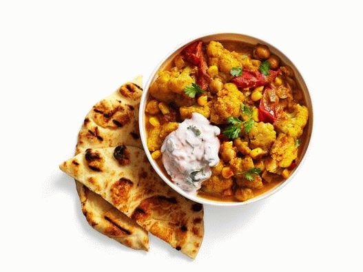 Photo Cauliflower in curry tomato sauce