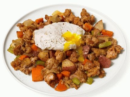 Photo Village hash with poached eggs