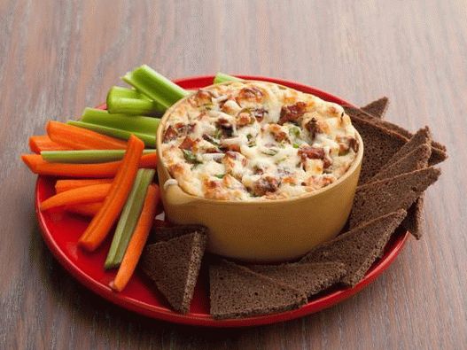 Photo dip sauce with Swiss cheese and bacon