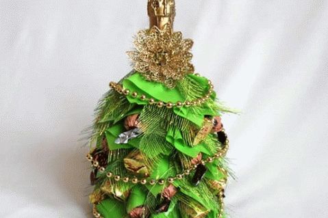 Christmas tree with sweet toys from a bottle of champagne