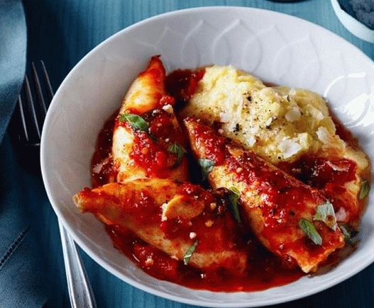 Photo Stuffed shrimp squid with polenta