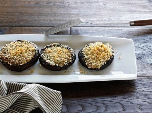 Photo Stuffed mushroom caps baked in the oven