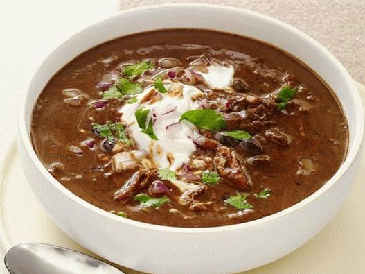 Photo Bean soup with turkey in a slow cooker