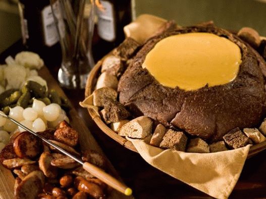 Photo of fondue with beer and cheddar in German