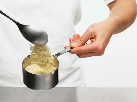 Pour almond flour into a measuring cup, removing excess Pour almond flour into a measuring cup, removing excess