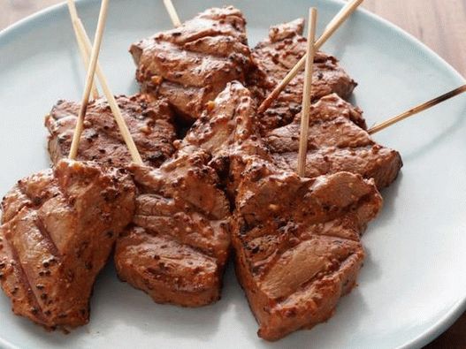 Photo of Beef on skewers in garlic mustard glaze on the grill