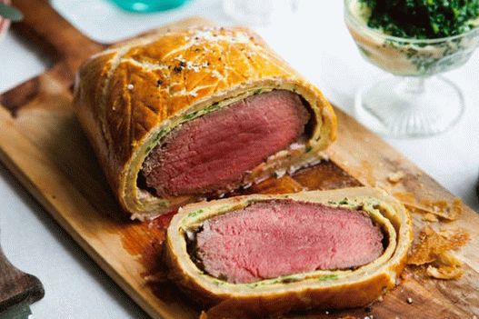 Photo of Beef Wellington with spinach and artichokes
