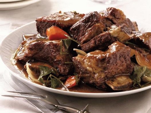 Photo Beef ribs in a slow cooker