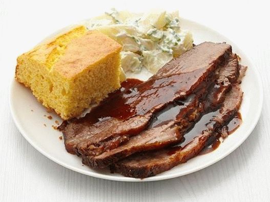 Photo of Beef brisket in a slow-cooker barbecue sauce