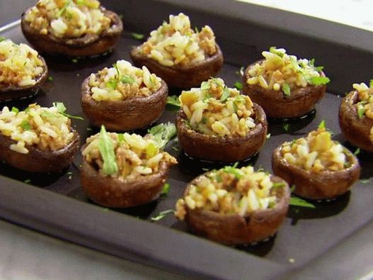 Photo Mushroom caps stuffed with ginger rice and minced meat