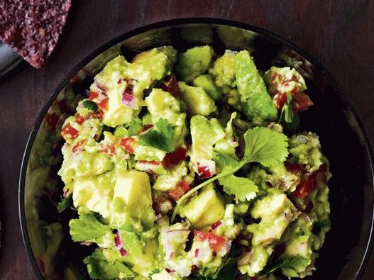 Photo of Guacamole with avocado slices