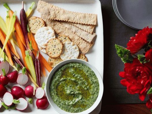 Photo Thick dip sauce of white beans and escariol