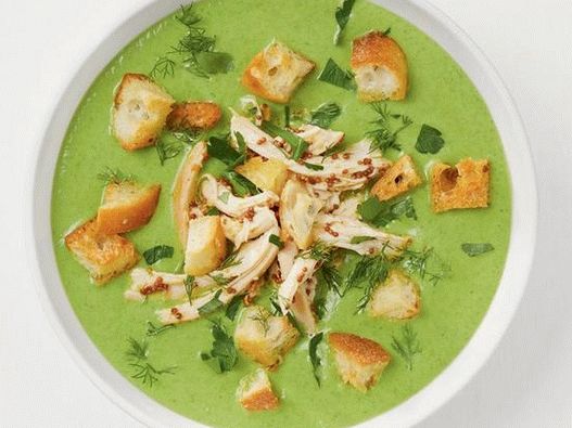Photo Cold zucchini mashed soup with pieces of smoked chicken
