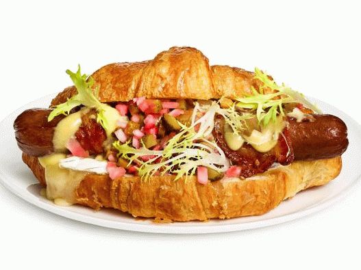 Photo of a hot dog with brie cheese from croissants