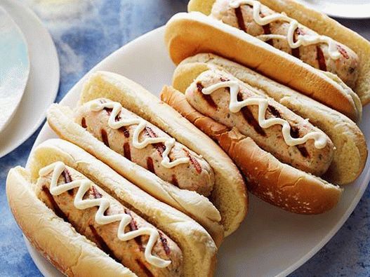 Photo Hot dogs with scallops and salmon sausages