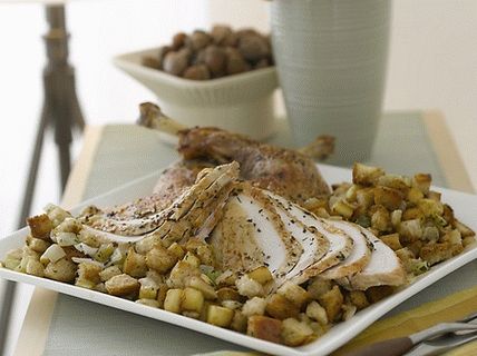 Photo Turkey baked in the oven with a side dish