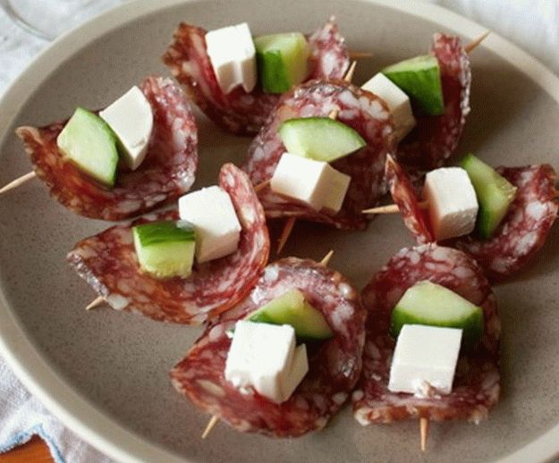 Canapes with salami and feta