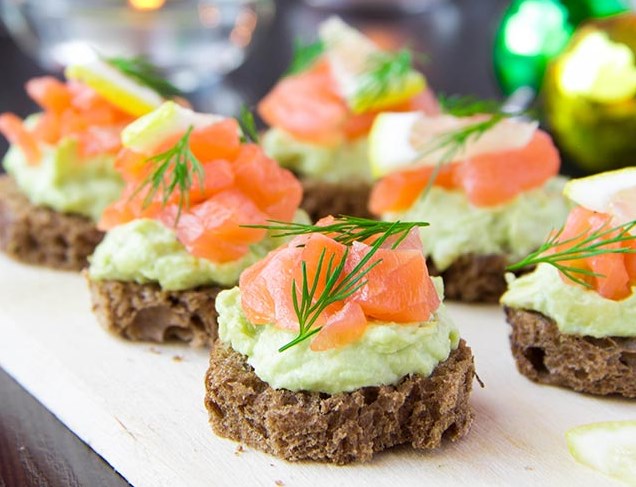 Canapes with salmon and avocado