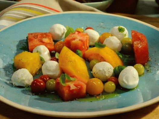 Photo of Caprese with tomatoes and mozzarella boccini