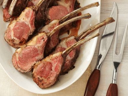 Photo of a rack of lamb with rosemary