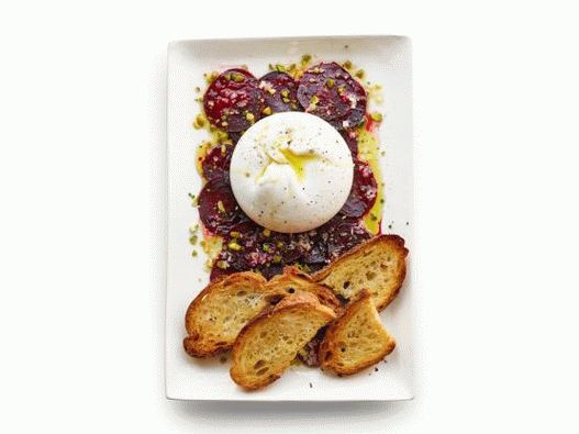 Photo of beetroot carpaccio with burrata cheese