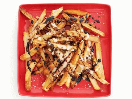 Photo French fries with balsamic sauce