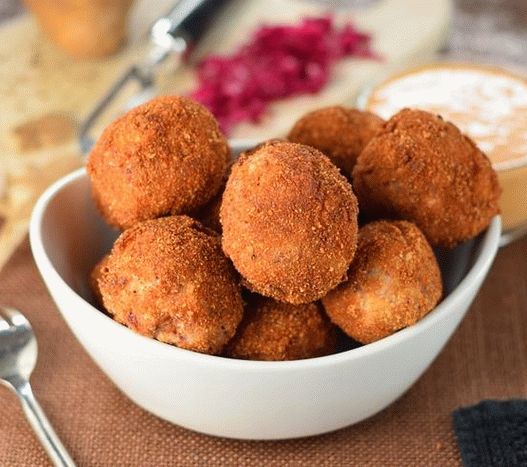 Photo Potato balls with sauerkraut