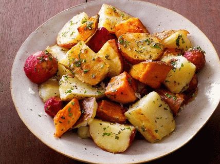 Photo Potato mix baked with herbs