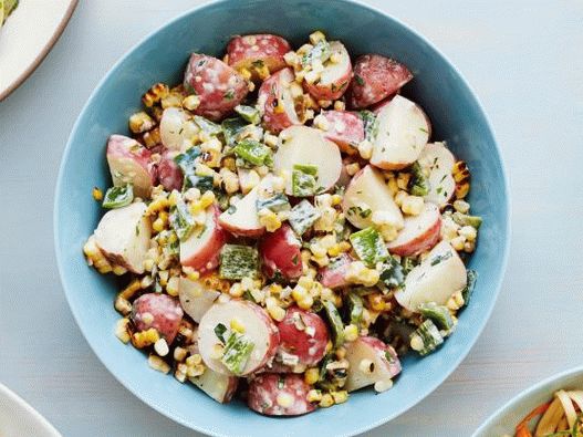 Photo Potato salad with corn and pepper