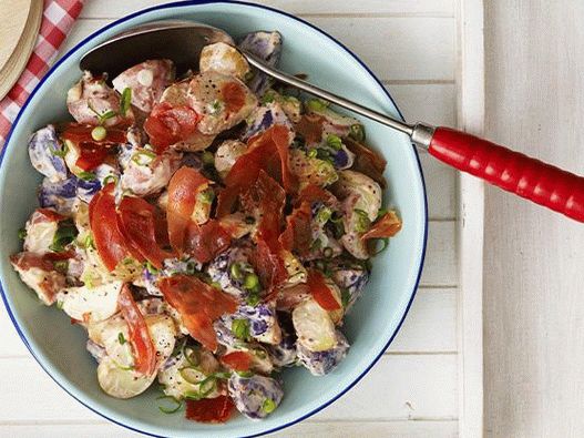 Photo Potato salad with prosciutto and mayonnaise dressing
