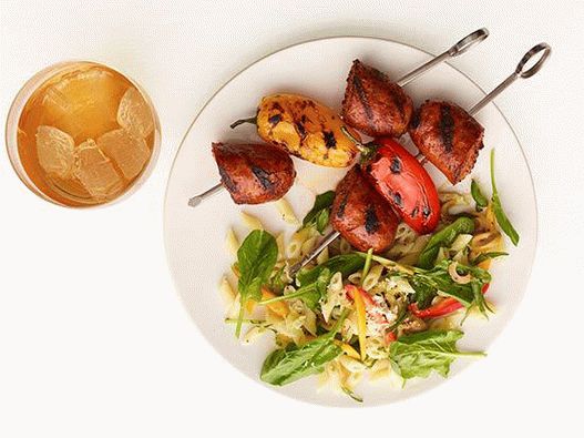 Photo of Kebab with grilled sausages and pasta salad