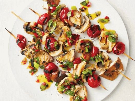 Photo of kebabs with mushrooms and pickles