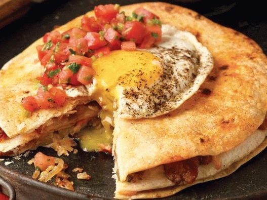 Photo of Quesadilla with bacon, potatoes and fried eggs