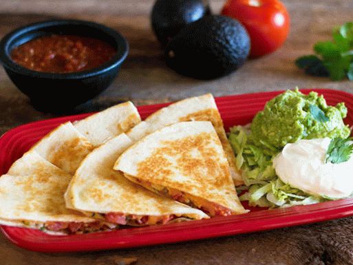Photo of Quesadilla with turkey and guacamole sauce