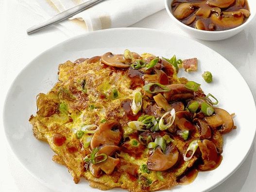 Photo Chinese Fu Yan omelet with mushroom sauce