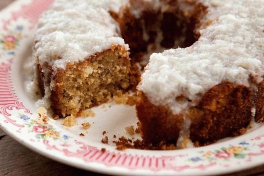 Photo Coconut muffin in a lemon-coconut glaze