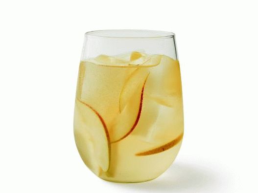 Photo Cocktail with sparkling wine and pear