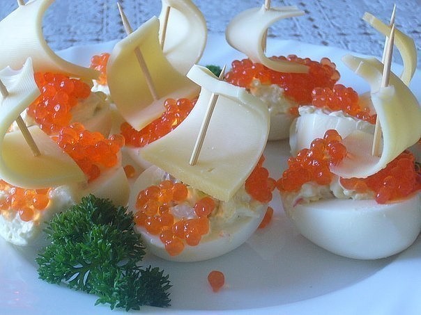 Boats from eggs with caviar