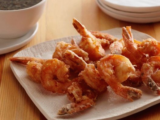 Photo of Shrimps in tempura with soya dip sauce with sake